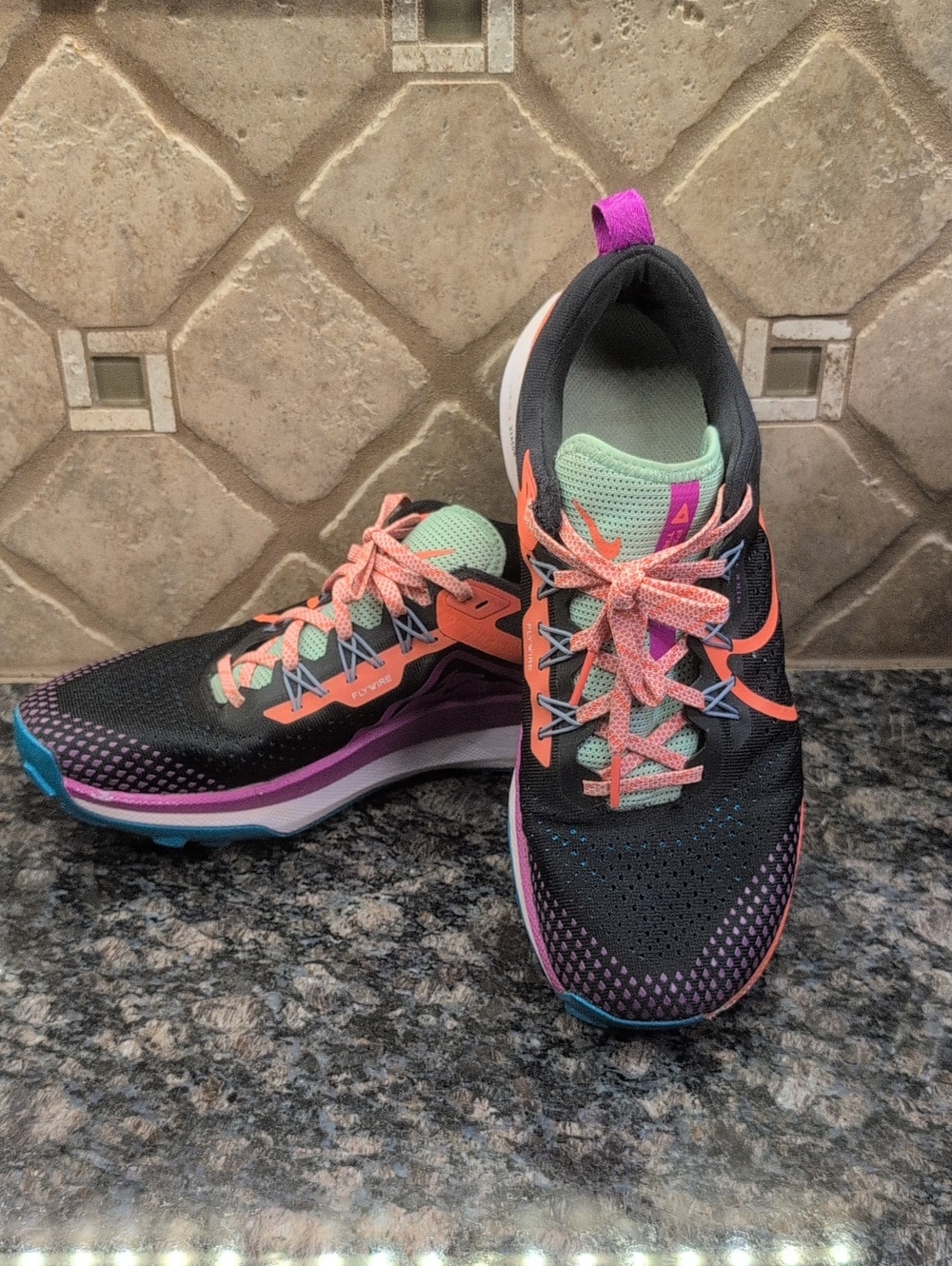 Nike Men's Black Running Shoes with Coral, Mint & Purple Accents
